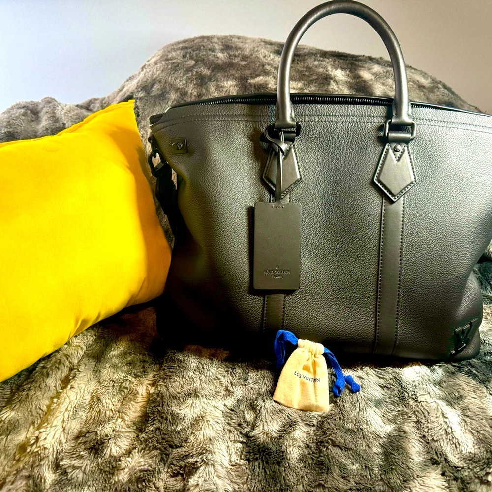 LOUIS VUITTON Lock It Tote slightly used got it from their flagship store.